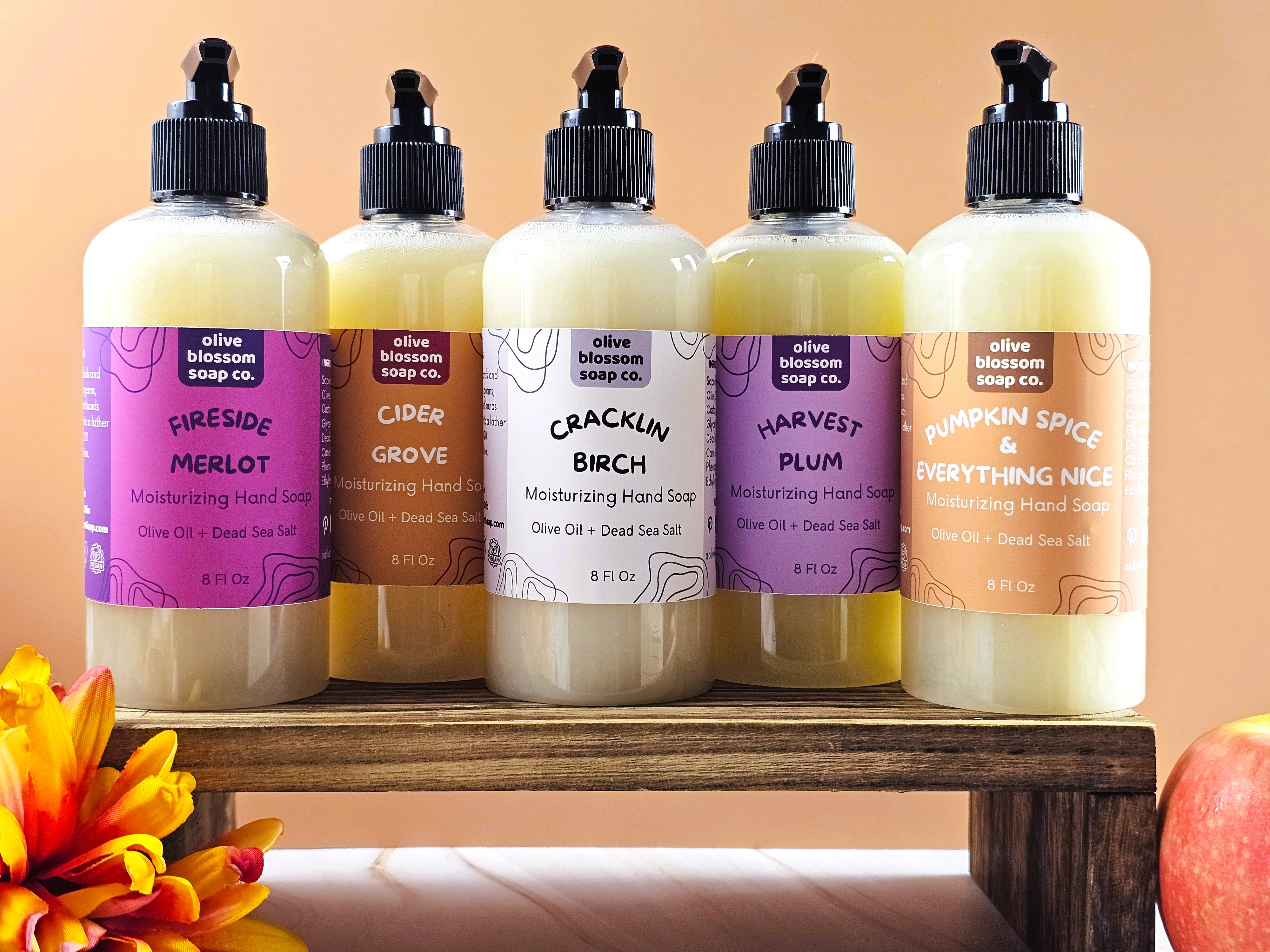 Collection of fall scented hand soap in 8 ounce pump bottles. Choose from Cider Grove, Harvest Plum, Cracklin Birch, Pumpkin Spice, and Fireside Merlot.